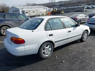 2001 Chevrolet Prizm z VIN 1Y1SK52871Z432340, wystawiony jako IAAI lot #41465388 z przebiegiem 122 272 mil mil oraz . Historia ofert i sprzedaży dostępna na DreamBid. Obrazek 4.