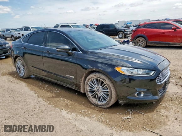 2013 Ford Fusion SE Hybrid with VIN 3FA6P0LU0DR267560, listed as a Copart auction lot 60563415 with 140,998 mi miles and Clean title. Bid and sale history available at DreamBid. Image 4.