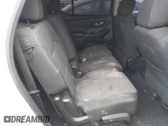 2020 Chevrolet Traverse LS z VIN 1GNERFKW7LJ258845, wystawiony jako IAAI lot #42013350 z przebiegiem 106 649 mil mil oraz . Historia ofert i sprzedaży dostępna na DreamBid. Obrazek 8.