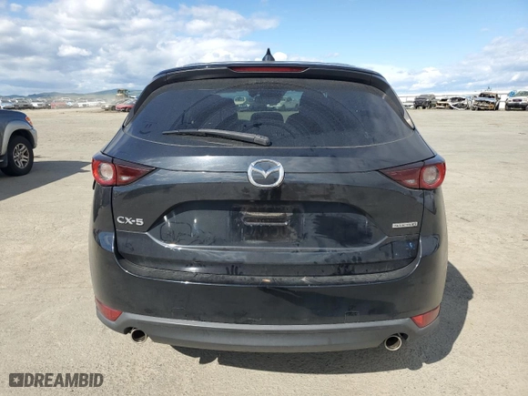 2020 Mazda CX-5 Touring with VIN JM3KFACM6L1800318, listed as a Copart auction lot 48128835 with 51,981 mi miles and Salvage Title. Bid and sale history available at carsss.com. Image 6.