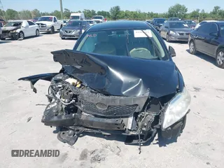 2010 Toyota Corolla with VIN 2T1BU4EE6AC533356, listed as a IAAI auction lot 41991922 with 117,555 mi miles. Bid and sale history available at carsss.com. Image 12.
