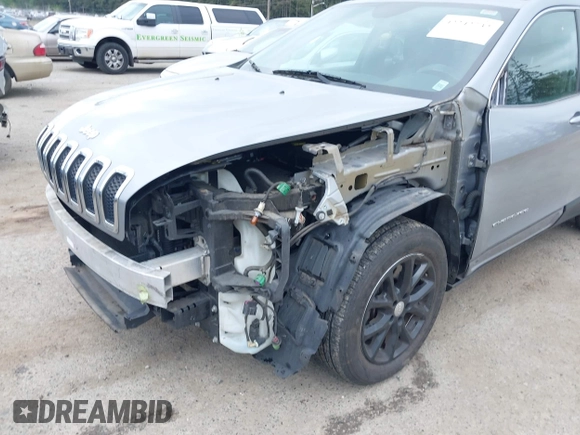 2014 Jeep Cherokee Latitude with VIN 1C4PJLCS1EW105984, listed as a IAAI auction lot 42242732 with 89,325 mi miles and . Bid and sale history available at DreamBid. Image 6.