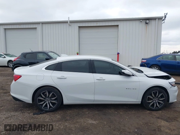 2018 Chevrolet Malibu LT z VIN 1G1ZD5ST4JF284966, wystawiony jako IAAI lot #41503355 z przebiegiem 99 181 mil mil oraz . Historia ofert i sprzedaży dostępna na DreamBid. Obrazek 13.