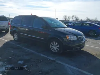 2016 Chrysler Town & Country Touring with VIN 2C4RC1BG7GR231704, listed as a IAAI auction lot 41306140 with 165,890 mi miles. Bid and sale history available at carsss.com. Image 1.