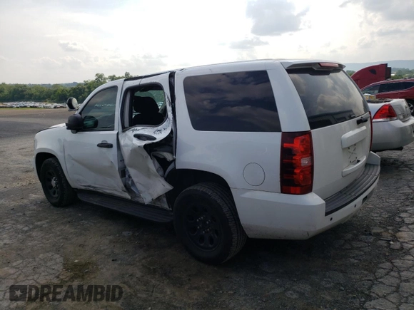 2013 Chevrolet Tahoe Commercial with VIN 1GNLC2E05DR328838, listed as a Copart auction lot 59747285 with 181,943 mi miles and Salvage title. Bid and sale history available at DreamBid. Image 2.