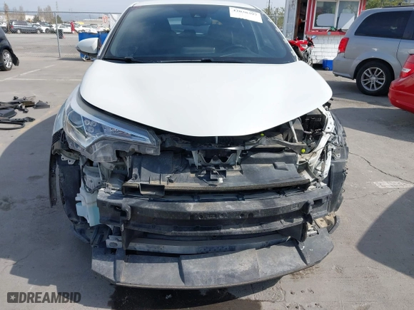 2018 Toyota C-HR XLE with VIN NMTKHMBX4JR049041, listed as a IAAI auction lot 42038397 with 74,930 mi miles. Bid and sale history available at carsss.com. Image 6.