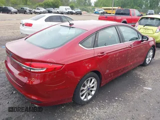 2017 Ford Fusion SE with VIN 3FA6P0H75HR221571, listed as a IAAI auction lot 42452297 with 91,354 mi miles and . Bid and sale history available at DreamBid. Image 4.