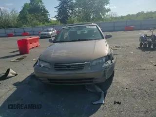 1999 Toyota Camry LE z VIN JT2BG22K0X0295893, wystawiony jako Copart lot #56183655 z przebiegiem 327 172 mil mil oraz Szkoda całkowita • Salvage title. Historia ofert i sprzedaży dostępna na DreamBid. Obrazek 13.