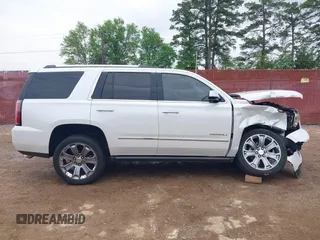 2016 GMC Yukon Denali with VIN 1GKS1CKJ7GR237852, listed as a IAAI auction lot 41944398 with 65,703 mi miles. Bid and sale history available at carsss.com. Image 14.