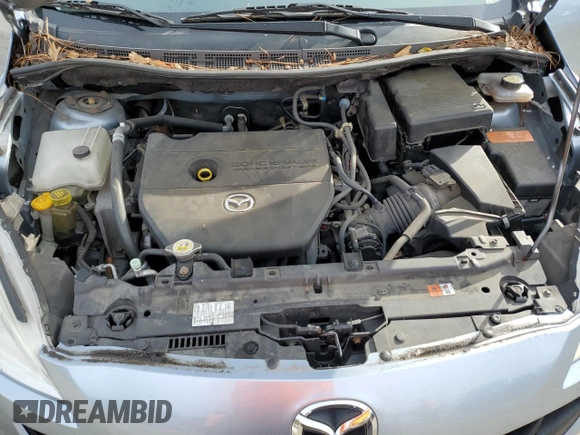 2012 Mazda 5 Sport с VIN JM1CW2BL2C0118957, выставлен на аукционе Copart как лот 82622764 с пробегом 107 691 миль миль и Списание • Salvage title. История ставок и продаж доступна на DreamBid. Изображение 14.