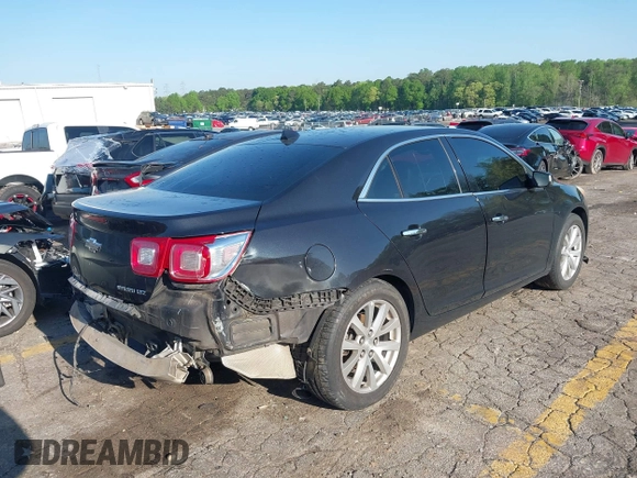 2014 Chevrolet Malibu LTZ with VIN 1G11H5SL9EF123813, listed as a IAAI auction lot 41984575 with 204,536 mi miles and . Bid and sale history available at DreamBid. Image 4.