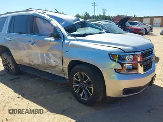2020 Chevrolet Tahoe LT with VIN 1GNSKBKC5LR121085, listed as a IAAI auction lot 42341677 with 123,579 mi miles and . Bid and sale history available at DreamBid. Image 1.