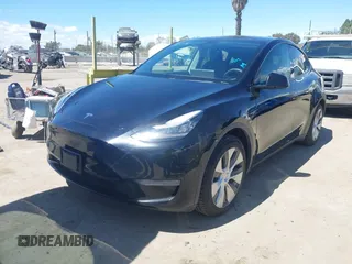 2020 Tesla Model Y Long Range with VIN 5YJYGDEE2LF059177, listed as a IAAI auction lot 41916260 with 66,190 mi miles and . Bid and sale history available at DreamBid. Image 2.