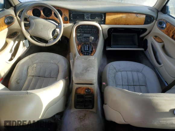 1998 Jaguar XJ with VIN SAJHX1245WC819762, listed as a Copart auction lot 81480174 with 132,491 mi miles and Salvage title. Bid and sale history available at DreamBid. Image 8.