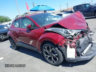 2019 Toyota C-HR XLE with VIN JTNKHMBX1K1060316, listed as a IAAI auction lot 41764464 with 42,956 mi miles. Bid and sale history available at carsss.com. Image 1.