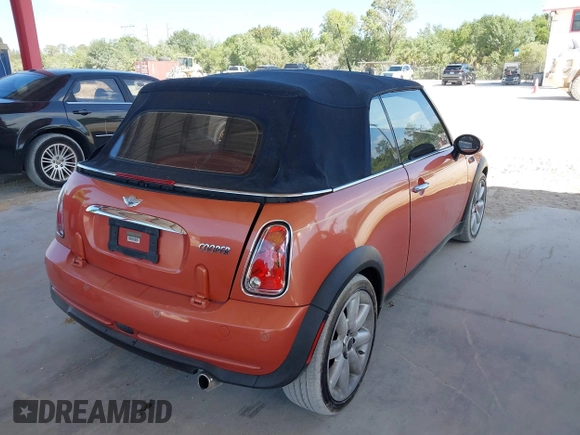 2005 MINI Convertible with VIN WMWRF334X5TF61026, listed as a IAAI auction lot 42125720 with 117,908 mi miles and . Bid and sale history available at DreamBid. Image 4.