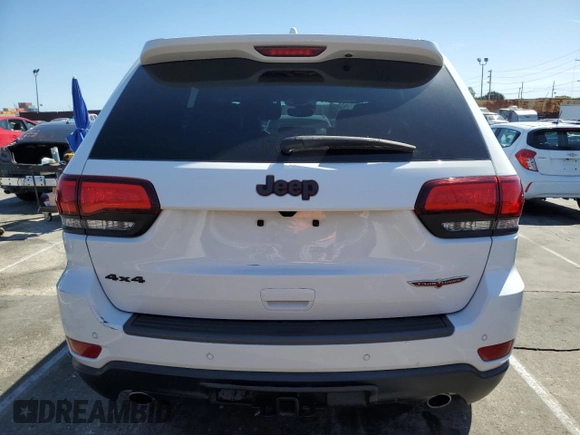 2021 Jeep Grand Cherokee Trailhawk with VIN 1C4RJFLG5MC565316, listed as a Copart auction lot 49899935 with 69,261 mi miles and Salvage Title. Bid and sale history available at carsss.com. Image 6.