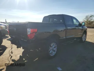 2021 Nissan Titan XD SV with VIN 1N6AA1FB9MN517657, listed as a Copart auction lot 79363644 with 100,628 mi miles and Salvage Title. Bid and sale history available at carsss.com. Image 3.