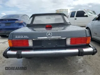 1987 Mercedes-Benz 560 with VIN WDBBA48D9HA060044, listed as a Copart auction lot 76965694 with 76,957 mi miles and Non Repairable. Bid and sale history available at carsss.com. Image 6.