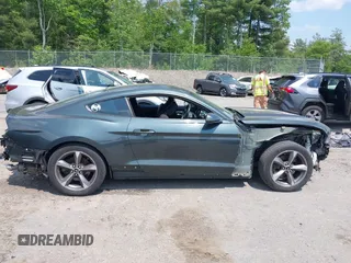 2016 Ford Mustang V6 with VIN 1FA6P8AM6G5263781, listed as a IAAI auction lot 42375721 with 91,519 mi miles and . Bid and sale history available at DreamBid. Image 14.