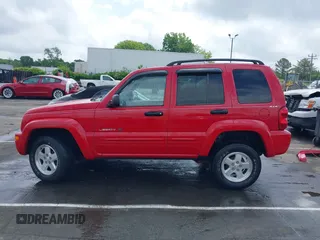 2002 Jeep Liberty Limited z VIN 1J8GL58K42W262492, wystawiony jako IAAI lot #42121270 z przebiegiem 167 662 mil mil oraz . Historia ofert i sprzedaży dostępna na DreamBid. Obrazek 15.