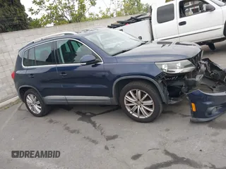 2012 Volkswagen Tiguan SE z VIN WVGAV7AX6CW510490, wystawiony jako IAAI lot #42098241 z przebiegiem 153 279 mil mil oraz . Historia ofert i sprzedaży dostępna na DreamBid. Obrazek 13.
