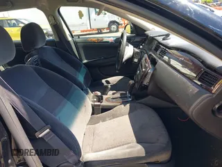 2014 Chevrolet Impala LT with VIN 2G1WB5E30E1166401, listed as a IAAI auction lot 42071504 with 158,813 mi miles and . Bid and sale history available at DreamBid. Image 5.