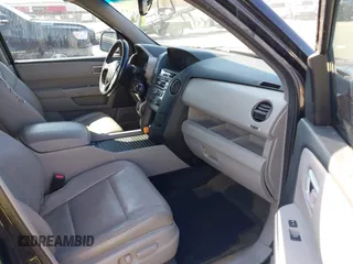 2014 Honda Pilot EX-L with VIN 5FNYF4H51EB025328, listed as a IAAI auction lot 41787439 with 169,313 mi miles and . Bid and sale history available at DreamBid. Image 5.
