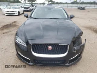2017 Jaguar XJ with VIN SAJWA1C73H8W10544, listed as a Copart auction lot 70025724 with 64,437 mi miles and Salvage Title. Bid and sale history available at carsss.com. Image 5.