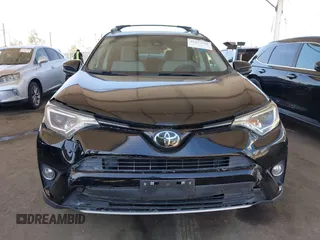 2018 Toyota RAV4 XLE with VIN 2T3WFREV2JW502622, listed as a IAAI auction lot 42327598 with 94,997 mi miles and . Bid and sale history available at DreamBid. Image 12.