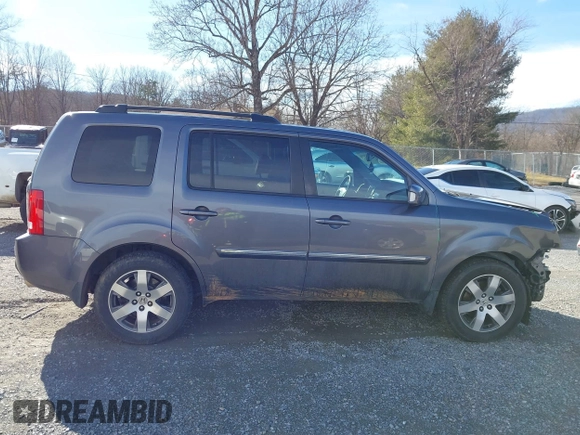 2014 Honda Pilot Touring with VIN 5FNYF4H95EB019048, listed as a IAAI auction lot 41526958 with 172,252 mi miles and . Bid and sale history available at DreamBid. Image 13.