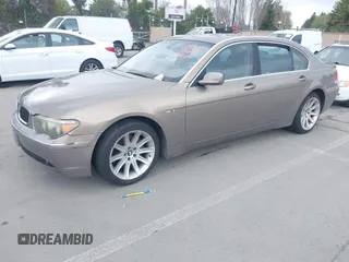2004 BMW 7 Series 745Li with VIN WBAGN63494DS45716, listed as a IAAI auction lot 41906522 with 127,292 mi miles. Bid and sale history available at carsss.com. Image 2.