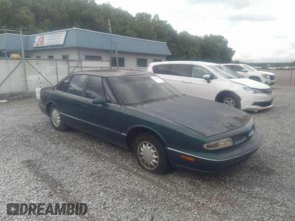 1998 Oldsmobile 88 LS z VIN 1G3HN52K5W4849011, wystawiony jako IAAI lot #42153650 z przebiegiem 171 969 mil mil oraz . Historia ofert i sprzedaży dostępna na DreamBid. Obrazek 1.