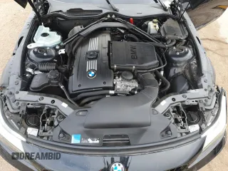 2011 BMW Z4 sDrive35i z VIN WBALM7C51BE383595, wystawiony jako Copart lot #54887695 z przebiegiem Nie podano mil oraz Szkody całkowita. Historia ofert i sprzedaży dostępna na DreamBid. Obrazek 11.