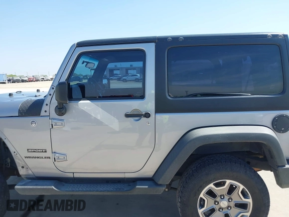 2014 Jeep Wrangler Sport with VIN 1C4AJWAG9EL155409, listed as a IAAI auction lot 41869906 with 102,400 mi miles and . Bid and sale history available at carsss.com. Image 15.