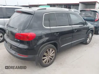 2012 Volkswagen Tiguan SE with VIN WVGAV7AX9CW611202, listed as a IAAI auction lot 41944210 with 118,002 mi miles and . Bid and sale history available at DreamBid. Image 4.