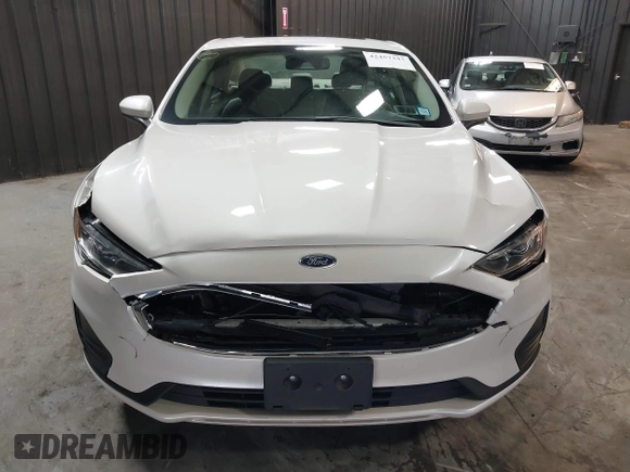2020 Ford Fusion SE z VIN 3FA6P0LU8LR142370, wystawiony jako IAAI lot #42457342 z przebiegiem 53 808 mil mil oraz . Historia ofert i sprzedaży dostępna na DreamBid. Obrazek 12.