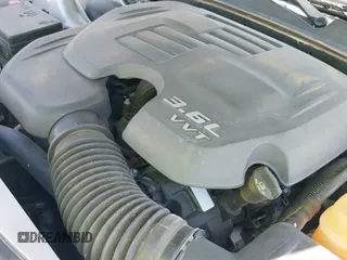 2012 Chrysler 300 Limited z VIN 2C3CCACG1CH309578, wystawiony jako IAAI lot #43423550 z przebiegiem 166 557 mil mil oraz . Historia ofert i sprzedaży dostępna na DreamBid. Obrazek 13.