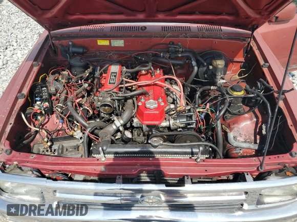 1994 Toyota Pickup DLX with VIN 4TARN81P3RZ163491, listed as a Copart auction lot 65920015 with 212,592 mi miles and Clean title. Bid and sale history available at DreamBid. Image 11.