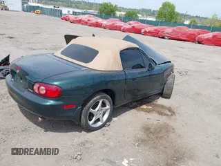 2001 Mazda MX-5 Miata with VIN JM1NB353810212361, listed as a IAAI auction lot 42128732 with 115,860 mi miles and . Bid and sale history available at DreamBid. Image 4.