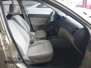 2009 Kia Spectra EX z VIN KNAFE221395647549, wystawiony jako IAAI lot #42408076 z przebiegiem 227 302 mil mil oraz . Historia ofert i sprzedaży dostępna na DreamBid. Obrazek 5.