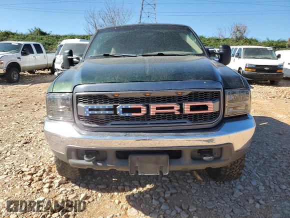 2000 Ford F-350 XL with VIN 1FTSW31F7YEE20820, listed as a Copart auction lot 77496284 with 312,193 mi miles and Salvage Title. Bid and sale history available at DreamBid. Image 5.