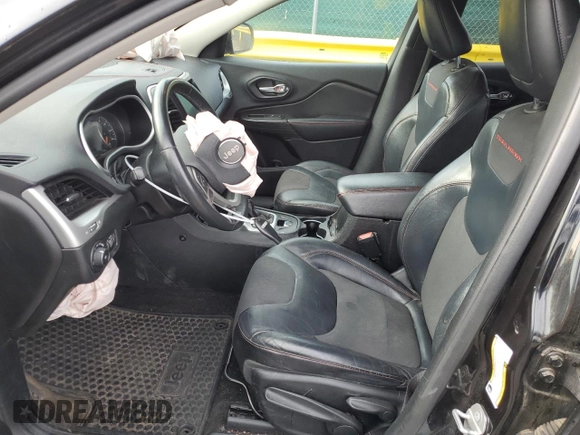 2015 Jeep Cherokee Trailhawk with VIN 1C4PJMBS9FW521872, listed as a Copart auction lot 55338955 with 146,602 mi miles and Salvage title. Bid and sale history available at DreamBid. Image 7.