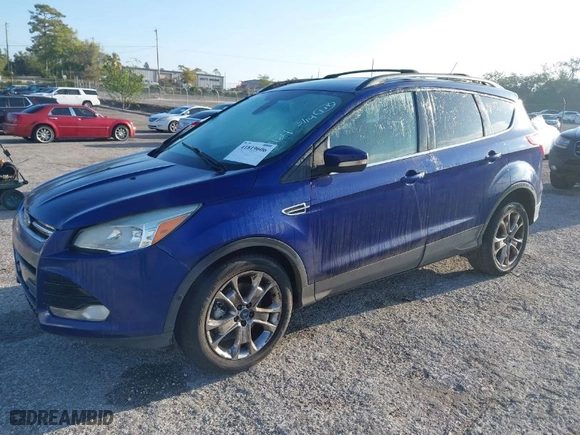 2013 Ford Escape SEL with VIN 1FMCU9H96DUB08464, listed as a IAAI auction lot 41819606 with 1 mi miles. Bid and sale history available at carsss.com. Image 2.