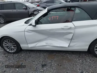 2016 BMW 2 Series 228i xDrive with VIN WBA1L9C59GV767802, listed as a IAAI auction lot 41132997 with 87,674 mi miles. Bid and sale history available at carsss.com. Image 6.