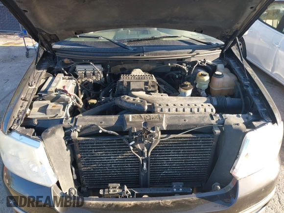 2005 Ford F-150 XLT with VIN 1FTPX14555NB72850, listed as a IAAI auction lot 41983657 with 229,268 mi miles. Bid and sale history available at carsss.com. Image 10.