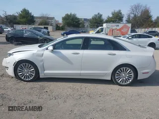 2016 Lincoln MKZ with VIN 3LN6L2J91GR620193, listed as a IAAI auction lot 41807038 with 61,235 mi miles. Bid and sale history available at carsss.com. Image 14.