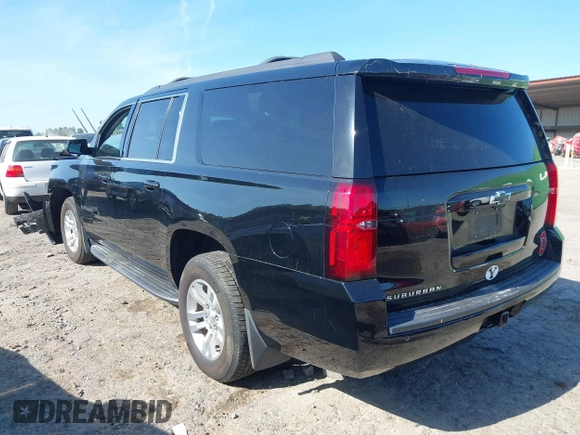 2019 Chevrolet Suburban LS with VIN 1GNSKGKC2KR353977, listed as a IAAI auction lot 42129814 with 85,454 mi miles and . Bid and sale history available at DreamBid. Image 3.