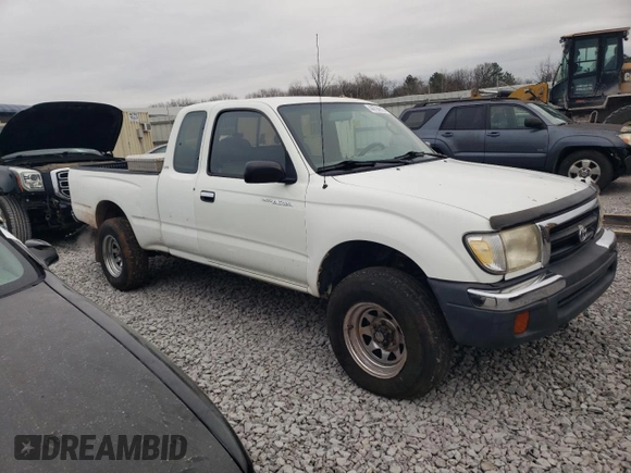 1998 Toyota Tacoma with VIN 4TAWN72NXWZ124547, listed as a Copart auction lot 44794815 with 242,757 mi miles and Salvage Title. Bid and sale history available at DreamBid. Image 4.