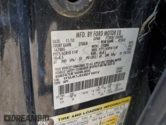 2011 Ford Expedition EL XLT with VIN 1FMJK1J5XBEF16012, listed as a Copart auction lot 65946594 with 214,129 mi miles and Salvage Title. Bid and sale history available at carsss.com. Image 16.